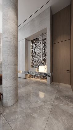 a large room with marble floors and walls