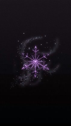 a snowflake is shown in the dark with blue lights on it's side