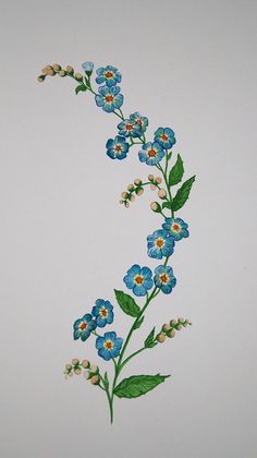 a blue flower with green leaves and white flowers painted on the side of a wall