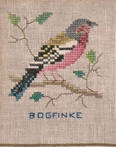 a cross stitched bird sitting on top of a tree branch with the word,'80