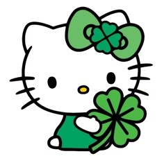 a hello kitty holding a green clover in her hand and wearing a bow on it's head