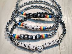 These Pride Bracelets are ideal for stacking with other bracelets. Each bracelet is made with dainty 4mm hematite (metallic looking) or black agate stones, plus rainbow beads and alphabet beads with your choice of message. Pride isn’t one size fits all—so Josie has created these bracelets with a variety of pride-themed sayings. Features: Genuine Hematite stacking bracelet with LGBT+ Pride sayings Customizable (Maximum 8 characters) Threaded on a strong elastic string material Looking for something that subtly makes your pronouns known, or shows your pride to the world? Look no further than these gorgeous handmade bracelets. Hematite and black agate are both known as very grounding stones, which we could all use a little more of when Pride month comes around. They help to ward off all sorts Feminist Bracelet, Pride Sayings, Ibd Awareness, Pride Bracelets, Grounding Stones, Black Agate Stone, Intention Bracelets, Pride Bracelet, Awareness Jewelry