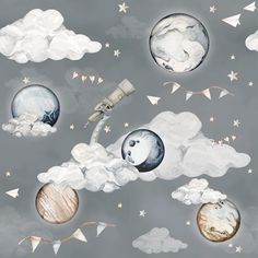 an image of some clouds and planets in the sky with kites flying around them