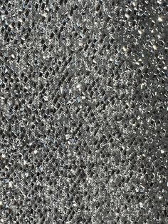 Lurex Fabric is composed of sparkling tinsel material sewed on a stretch mesh. 2 way stretch. Use this on apparels, drapes, and home decors. Light weight and easy to work with. This fabric is perfect for photo booth backdrop, garments, and fashion accessory accents. Fabric made from 100% polyester. Lurex Fabric, Booth Backdrops, Silver Tinsel, 3d Texture, Photo Booth Backdrop, Table Cover, Color Matching, Photo Booth, Metallic Silver