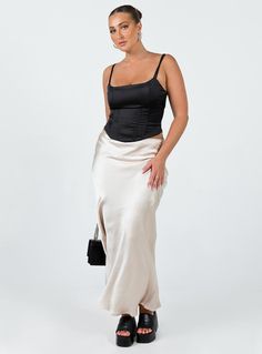 Maxi skirt Slim fitting 95% polyester 5% spandex Silky material Invisible zip fastening at side Slight stretch Unlined Champagne Skirt Outfit, Long Silk Skirt Outfit, Champagne Skirt, Silk Skirt Outfit, Going Out Skirts, Hot Skirts, Clubbing Outfits, Knit Maxi Skirt, Pink Formal Dresses