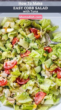 a salad with lettuce and tomatoes in a white bowl