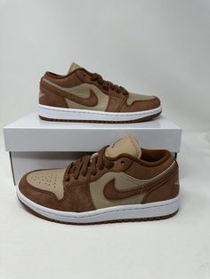 Brand New Nike Air Jordan 1 Low SE Shoes "Coffee" Legend Brown FJ3453-200 Womens Sizes:  6.5, 7, 7.5, 8, 8.5, 9, 10W/8.5M, 10.5W/9M, 11W/9.5M SKU: FJ3453-200 Condition: These are brand new with box. Never worn. Perfect Condition. Pet and smoke free home! Box Condition: BOXES MAY HAVE SOME DAMAGES DUE TO NATURAL SHIPPING AND STORAGE REASONS!  DAMAGE MAY INCLUDE THE FOLLOWING: - SLIGHT RIPS AND TEARS ALONG THE BOX - DENTS OR SLIGHT BOX DEFORMITY - SLIGHT CUTS/SLITS FROM OPENING THE PACKAGE SHOES W Air Jordans Brown, Brown Jordans Sneakers, Jordans Brown Low, Brown Jordans, Air Jordan 1 Low Brown, Jordan 1 Low Brown, Rainbow Shoe, Snicker Shoes, Nike Brown