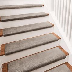 a set of stairs with carpet on them