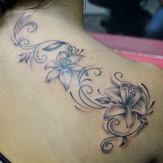 a woman with a tattoo on her back