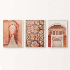 three pictures hanging on the wall in different colors and sizes, each with an intricate design