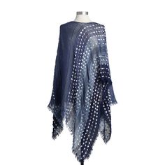 This textured poncho has a unique ability to transition from season to season without giving up style. Made as a limited-edition item for the spring and summer seasons, ponchos as beautiful as this are ideal for everyday use or gifting. No matter the occasion this versatile design will give any woman the confidence she needs to meet the day! Perfect for every occasion from a hot summer barbecue to a cool fall day in the pumpkin patch, this out-of-the-box look with subtle fray edge detail can mak Chic Poncho For Layering, Chic One-size Poncho For Layering, Chic One Size Cape Poncho, Chic One-size Cape Poncho, Chic One-size Poncho Shawl, Chic Oversized Shawl, Oversized Chic Shawl, Chic One-size Shawl Cape, Chic One Size Poncho With Batwing Sleeve