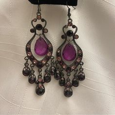 Beautiful Purple Center Stone With Other Dark Purple Stones And Black Metal. Unbranded 4" Drop Chandelier Earrings Never Worn Elegant Purple Dangle Chandelier Earrings, Purple Metal Dangle Chandelier Earrings, Purple Metal Chandelier Dangle Earrings, Purple Dangle Chandelier Earrings For Party, Purple Dangle Earrings For Evening, Stone Chandelier, Drop Chandelier, Jewelry Purple, Dangle Earrings Boho