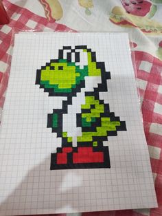 a piece of paper that has been made to look like an old school video game character