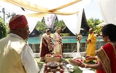 the bride and groom are getting ready to have their wedding ceremony in front of them