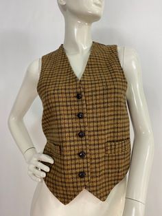 "Pat mcdonagh vest, vintage pat mcdonagh vest, vintage plaid wool vest, women's size small * please see last pictures the back is a little discoloured because of the age of the garment, no rips or tears  Measurements:  Shoulder (outer seam-seam)12\"/bust/chest(armpit-armpit)17\"/waist 16\"/length 18\"-22\"(front)/back length 17\" Mannequin measurements:  5'8\", bust 34\", waist 25\", hip 33\" Please note that vintage clothing sizes can vary greatly.  The Measurements provided  are approximate and are taken lying flat.  I suggest taking a similar garment from your wardrobe and measure it while lying flat.  This way you can compare measurements.  All of our pieces are genuine vintage. Don't forget to enlarge the photos and take a closer look at this genuine vintage item!! I will ship your it Thrifting Inspiration, Clothing Board, Wool Vest, Vest Outfits, Vintage Plaid, Wool Plaid, The Age, Womens Vest, Vintage Clothing