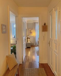 the hallway is clean and ready to be used as a living room or dining area