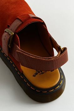 Mule style clog by Dr. Martens. Features a strap at the back with an adjustable buckle. Outstitch detailing and finished with a lugged sole. Content + Care Leather, rubber Spot clean Imported | Dr. Martens Jorge II Clog in Brown, Men's at Urban Outfitters Comfy Womens Shoes, Dr Marten Clog Outfit, Women’s Clogs, Clog Shoes Outfit, Clogs And Socks, Dr Martens Jorge Ii, Dr Martens Jorge, Clog Outfit, Vintage Clogs