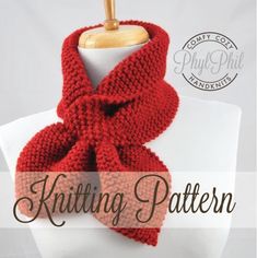 a red knitted scarf on top of a white mannequin with the words knitting pattern written below it