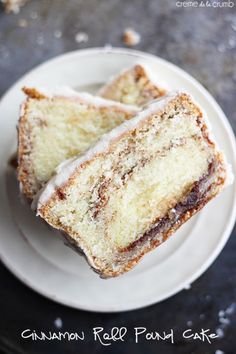 two pieces of cinnamon roll pastry on a plate