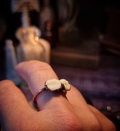 This unique steampunk-inspired ring showcases a mesmerizing blend of teeth-like gears and copper elements. The intricate design features carefully crafted gear motifs that resemble interlocking teeth, creating a captivating visual effect. The use of copper adds an authentic steampunk touch, with its warm, rustic hue complementing the industrial aesthetic. This ring exudes a sense of mechanical elegance and offers a distinctive accessory for those who appreciate the fusion of Victorian-era aesthe Teeth Ring, Victorian Era Aesthetic, Tooth Ring, Industrial Aesthetic, Copper Ring, Copper Rings, Intricate Design, Visual Effects, Victorian Era