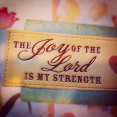 the boy of the lord is my strength on a leather label with flowers in the background