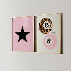 two framed art pieces with numbers and a star on the bottom one is pink, the other is black