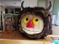 an animal mask is sitting on top of a table