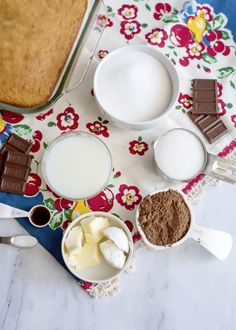 a table topped with lots of different types of food