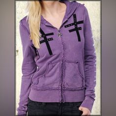 Affliction Rotate Skull Crossbone Key Sweatshirt Purple Size L Nwt Affliction Rotate Women's Long Sleeve Zip Front Hoodie Features Two Black Double Barred Crosses Sewn On The Front And Accented With Metal Studs On The Chest. The Back Features A Large Floral Skull And Skeleton Key Crossbones In Silver Foil. Affliction Logo In Silver Foil On Each Sleeve. Affliction Locket Zipper Pull. Lava Wash For Vintage Look. 100% Cotton French Terry, Lightweight Fleece, Vintage Fit. Garment Dyed With Silicon W Gothic Distressed Tops For Streetwear, Fitted Purple Top For Streetwear, Hooded Emo Cotton Top, Emo Hooded Cotton Top, Fall Emo Hooded Tops, Emo Hooded Tops For Fall, Y2k Fall Purple Tops, Purple Y2k Tops For Fall, Y2k Purple Tops For Fall