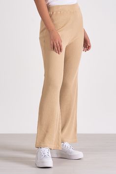 Lounge in luxury with Odie pants. These wide-leg waffle knit trousers merge sweatpant comfort with elevated style for a cozy yet chic look. Denim Dress Fall, Jumpsuit Coverup, Fall Bottoms, Knit Trousers, Jumpsuit Fall, Elevated Style, Cardigan Sweater Dress, Henley Top, Crop Top Sweater