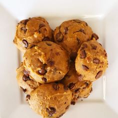 a white plate topped with chocolate chip cookies