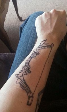 a person with a tattoo on their arm