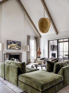 a living room filled with furniture and a fire place