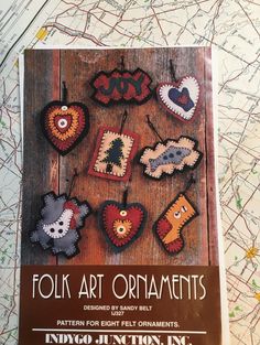 an advertisement for folk art ornaments on a map