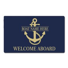 a welcome aboard sign with an anchor and rope on the front, in gold foil