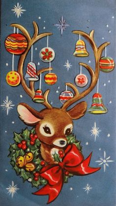 a christmas card with a deer's head holding a wreath and bells on it