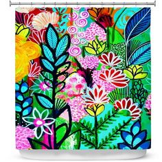 a colorful shower curtain with flowers and leaves