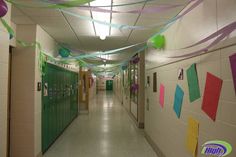 the hallway is decorated with streamers and balloons