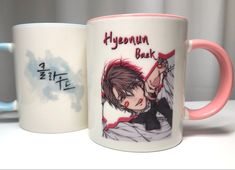 two coffee mugs with anime characters on them