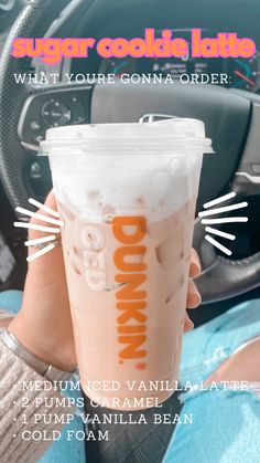 Dunkin Donuts coffee order sugar cookie latte medium vanilla iced latte, 2 pumps caramel, 1 pump vanilla bean, cold foam. Iced coffee order Dunkin Donuts Iced Coffee Fall, Hot Dunkin Donuts Drinks, Dunkin Latte Order, Dunkin Iced Latte Order, Dunkin Donuts Order, Diy Slushies