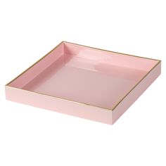 a pink tray with gold trim