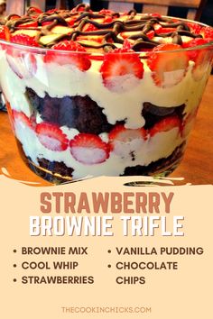 strawberry brownie trifle in a glass dish with chocolate chips