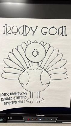 a sign that says ready god on it in front of a computer screen with an image of a turkey