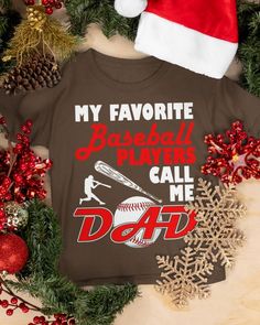 a t - shirt that says, my favorite baseball players call me dad on it