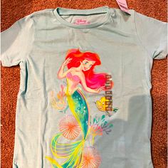 Size 5t Nwt Ariel T Shirt In Light Blue; Smoke Free And Pet Free Home Mermaid T Shirt, Ariel Mermaid, Cell Phone Holster, Phone Holster, Walker Boots, Fit N Flare Dress, Rain And Snow Boots, Boot Sandals, Fit & Flare