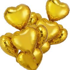 gold heart shaped balloons arranged in the shape of hearts