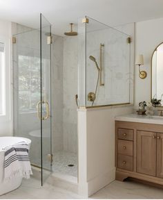 a bath room with a sink a mirror and a tub