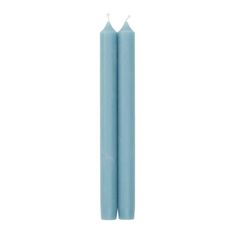 two light blue candles on a white background