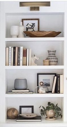 Stylish bookcase Black And Neutral Shelf Decor, Feminin Office Work Spaces, Studio Mcgee Wreath Fall, Five Shelf Bookcase Decor, Living Room Built In Cabinets With Doors, Office Credenza Styling, How To Make Books Look Good On A Shelf, Narrow Dining Room Built Ins, Shelve Decor Bedroom