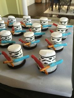 star wars themed cupcakes are arranged on a table